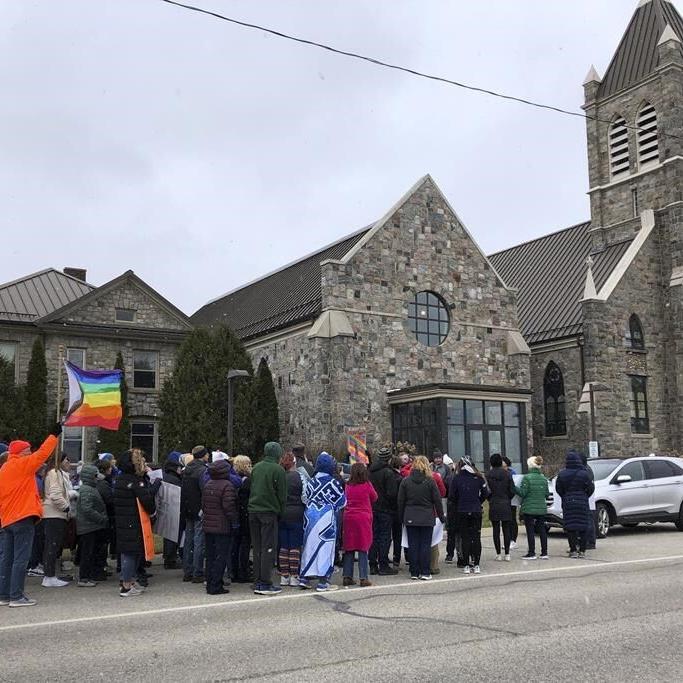 Catholic priest resigns from Michigan church following protests over his criticism of a gay author